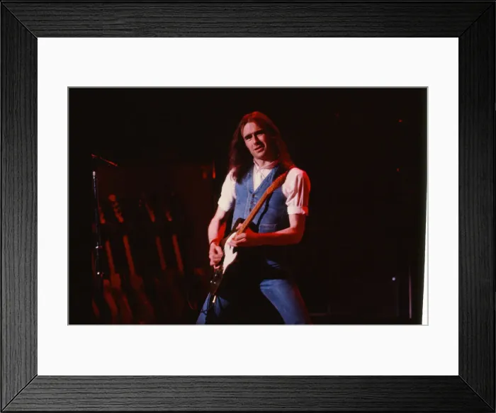 Framed Print : Status Quo, English rock band, onstage in 1981. Picture shows lead singer Framed Print : Status Quo, English rock band, onstage in 1981. Picture shows lead singer