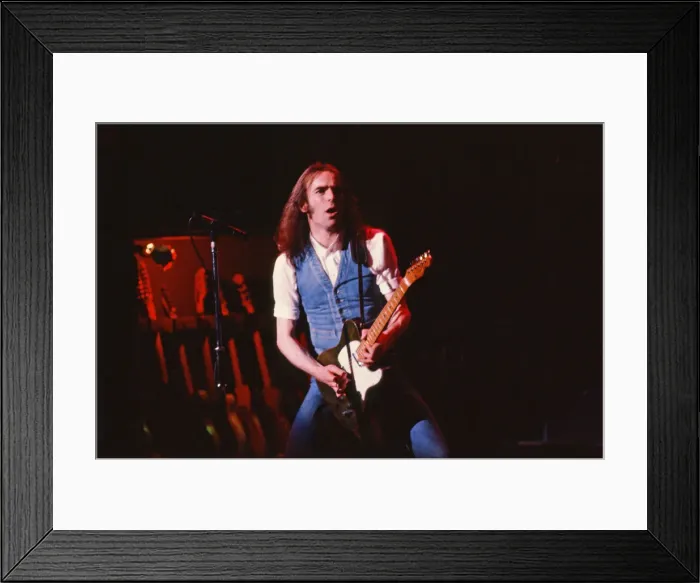 Framed Print : Status Quo, English rock band, onstage in 1981. Picture shows lead singer Framed Print : Status Quo, English rock band, onstage in 1981. Picture shows lead singer