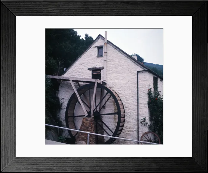 Framed Print : A water wheel on a house in Polperro, Cornwall. 1973 Framed Print : A water wheel on a house in Polperro, Cornwall. 1973