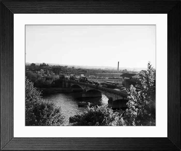 Framed Print : Staines Bridge, a road bridge running in a south-west to north-east direction across Framed Print : Staines Bridge, a road bridge running in a south-west to north-east direction across