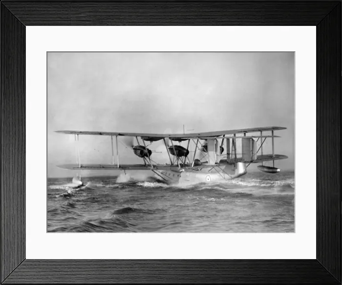 Framed Print : A Blackburn Perth aircraft of 204 Squadron seen here taking off from the sea near