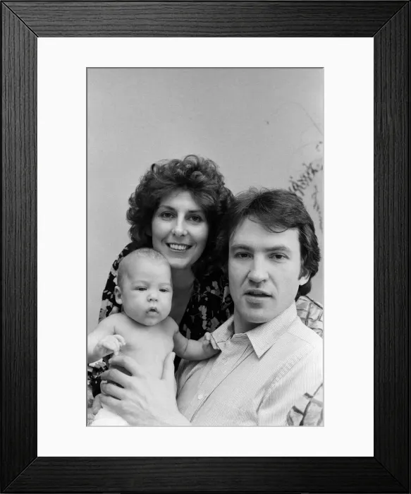 Framed Print : Actor Larry Lamb with his wife Linda and three month old son George. 15th March 1980 Framed Print : Actor Larry Lamb with his wife Linda and three month old son George. 15th March 1980