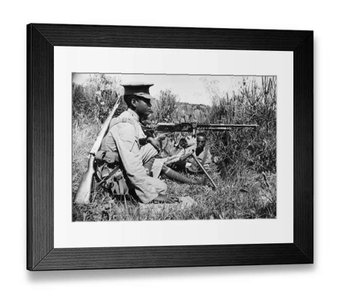 Framed Print : Abyssinian War September 1935 Abyssinian machine gunner firing an old Hotchkiss Framed Print : Abyssinian War September 1935 Abyssinian machine gunner firing an old Hotchkiss