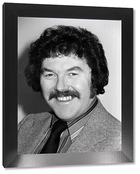 Portrait of Dickie Davies, television sports commentator. February 1976