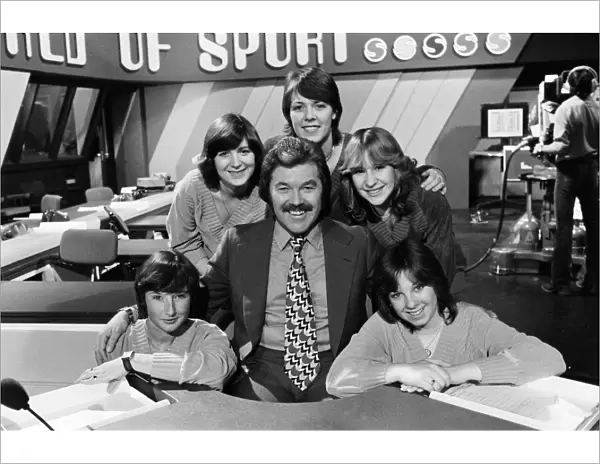 ITVs World of Sport presenter Dickie Davies with five women who work with