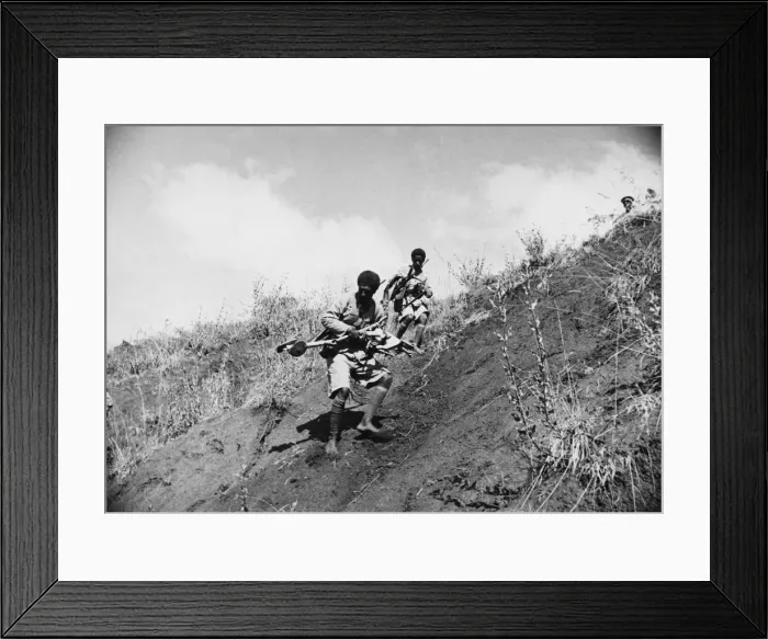 Framed Print : Abyssinian War September 1935 Abyssinian troops advancing making for a new position Framed Print : Abyssinian War September 1935 Abyssinian troops advancing making for a new position