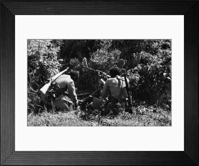 Framed Print : Abyssinian War September 1935 Abyssinian machine gunner firing an old Hotchkiss