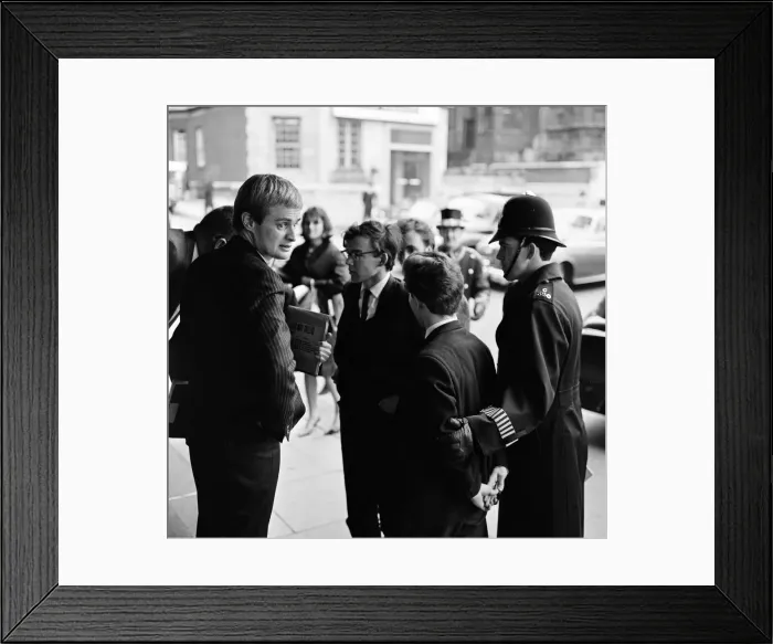 Framed Print : For a brief moment outside the Dorchester Hotel six students from Queen Mary