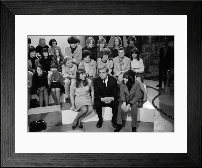 Framed Print : For a brief moment outside the Dorchester Hotel six students from Queen Mary