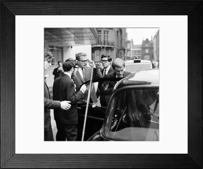 Framed Print : For a brief moment outside the Dorchester Hotel six students from Queen Mary Framed Print : For a brief moment outside the Dorchester Hotel six students from Queen Mary