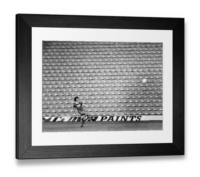 Framed Print : Terry McDermott plays his last game for Liverpool in front of an empty stand Framed Print : Terry McDermott plays his last game for Liverpool in front of an empty stand