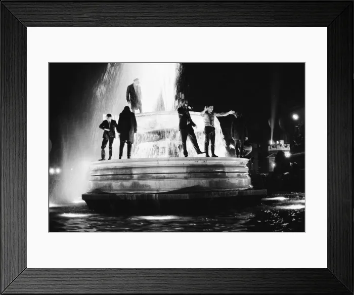 Framed Print : New Years Day 1967. Young people celebrate in the fountains at Trafalgar Square, London Framed Print : New Years Day 1967. Young people celebrate in the fountains at Trafalgar Square, London