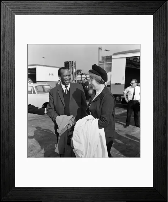 Framed Print : Prime Minister of Bechuanaland, Seretse Khama, and his wife Ruth Williams Khama arriving