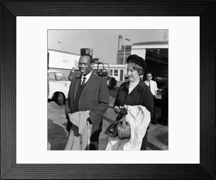 Framed Print : Prime Minister of Bechuanaland, Seretse Khama, and his wife Ruth Williams Khama arriving