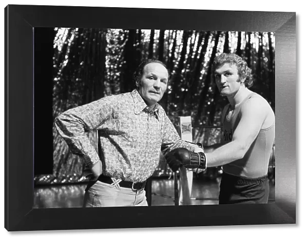 Britains Joe Bugner (Right) pictured with fellow boxer Henry Cooper in America ahead