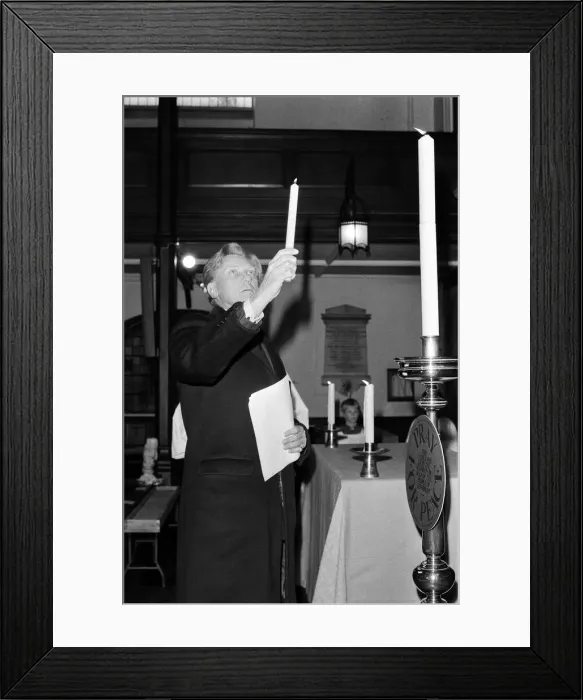 Framed Print : Michael Heseltine, Secretary of State for Defence, lighting the candle at St Mary Framed Print : Michael Heseltine, Secretary of State for Defence, lighting the candle at St Mary