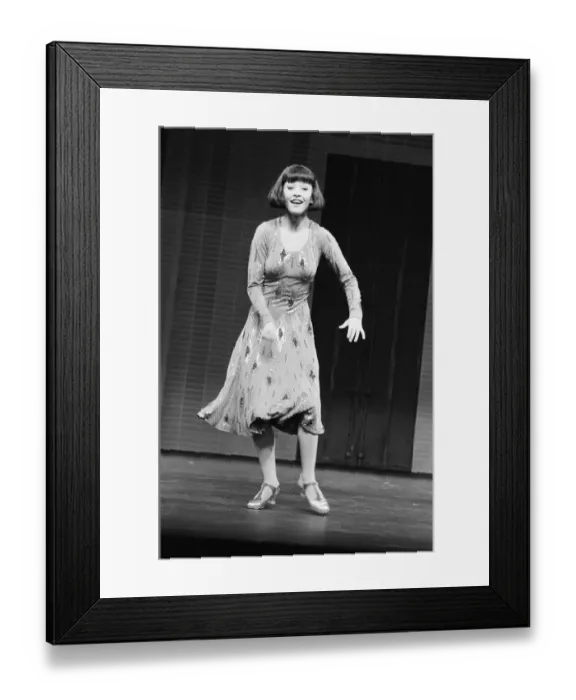 Framed Print : Catherine Zeta Jones dancing and playing the part of Peggy Sawyer in 42nd Street