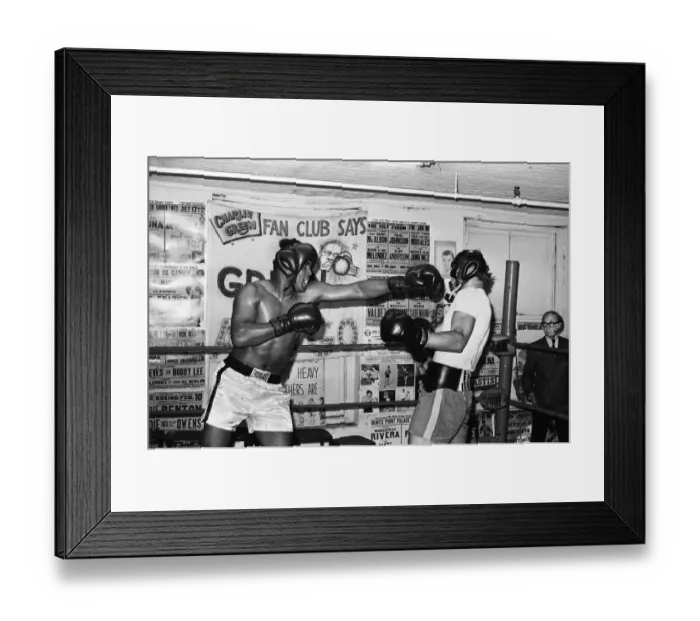 Framed Print : Muhammad Ali (right) sparring with a young Joe Bugner at a gym in New York City