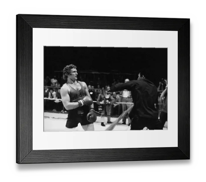 Framed Print : Muhammad Ali clowning around with Britains Joe Bugner at his training camp