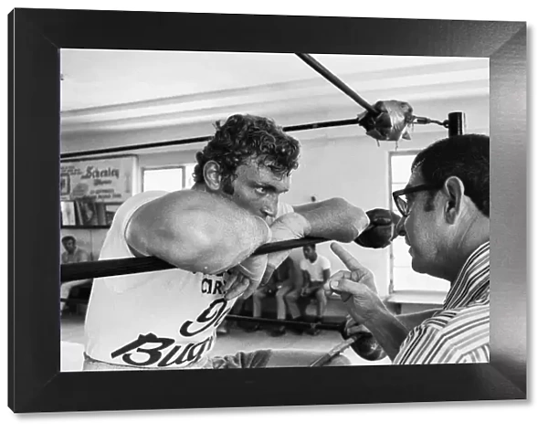 A young Joe Bugner (left) with boxing trainer Angelo Dundee in a New York gym