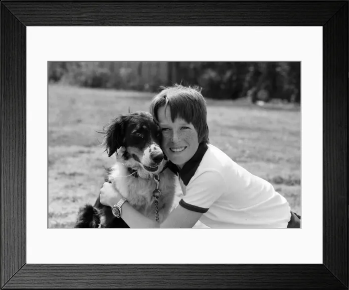 Framed Print : 9 year old Simon Mallon who lives in Shaldon, Devon, was given a puppy for his birthday Framed Print : 9 year old Simon Mallon who lives in Shaldon, Devon, was given a puppy for his birthday