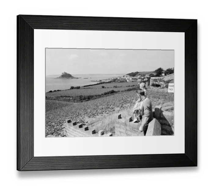 Framed Print : A man and girl looking out to St Michaels Mount, Cornwall, September 1968