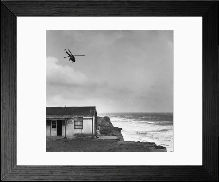 Framed Print : Search for missing girls. A RAF search and rescue Westland Whirlwind flies above Framed Print : Search for missing girls. A RAF search and rescue Westland Whirlwind flies above
