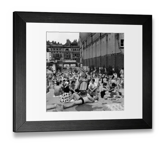 Framed Print : People enjoying the warm weather at Endell Street open air baths, London. 5th August 1954