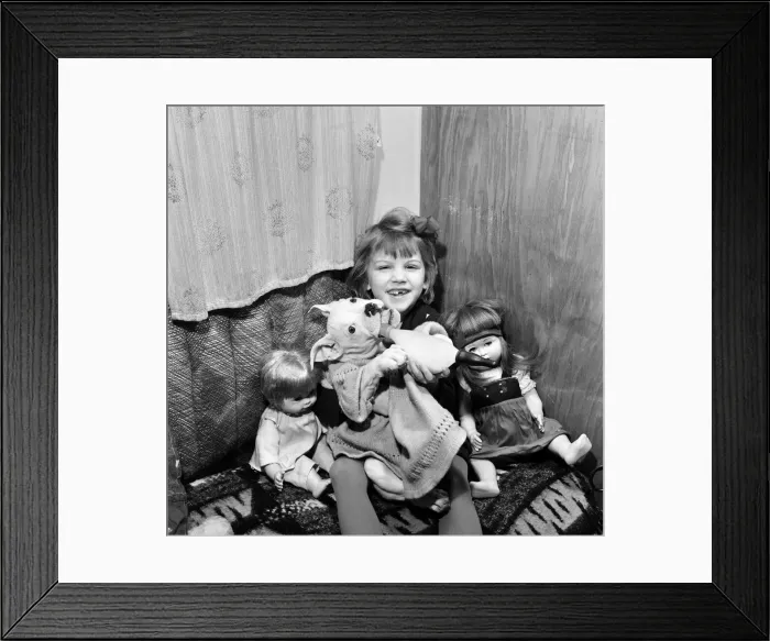 Framed Print : Little Danish girl Tina Dubsky, daughter of Joseph Dubsky who has a comic Bulldog act