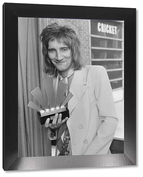 Rod Stewart holding his Best Singer Award at The Oval Pop Festival, Oval Cricket Ground