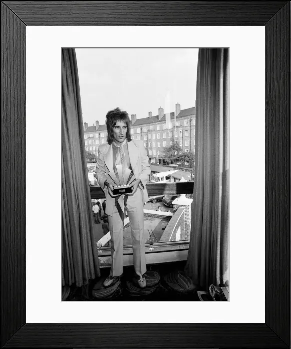 Framed Print : Rod Stewart holding his Best Singer Award at The Oval Pop Festival Framed Print : Rod Stewart holding his Best Singer Award at The Oval Pop Festival