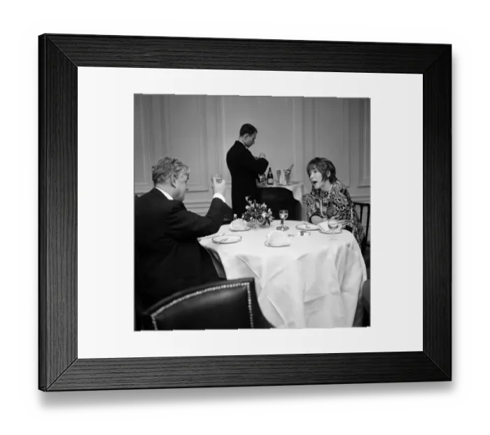 Framed Print : Quintin Hogg MP in conversation with film star Shirley MacLaine at the Savoy Hotel Framed Print : Quintin Hogg MP in conversation with film star Shirley MacLaine at the Savoy Hotel