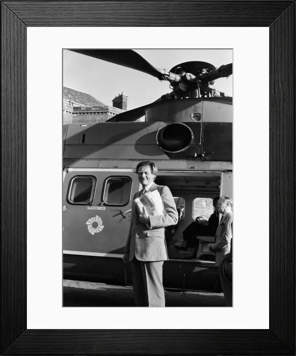 Framed Print : Michael Heseltine about to get into a helicopter. He is pictured a few days following his Framed Print : Michael Heseltine about to get into a helicopter. He is pictured a few days following his