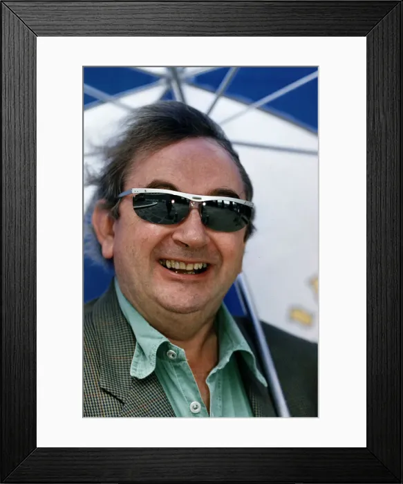 Framed Print : Ian McCaskill wearing a pair of Topman Sunglasses holding umbrella C / photo Framed Print : Ian McCaskill wearing a pair of Topman Sunglasses holding umbrella C / photo
