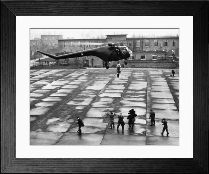 Framed Print : A Bristol Sycamore HR13 Helicopter delivers a special guest to RAF Linton 18th December Framed Print : A Bristol Sycamore HR13 Helicopter delivers a special guest to RAF Linton 18th December