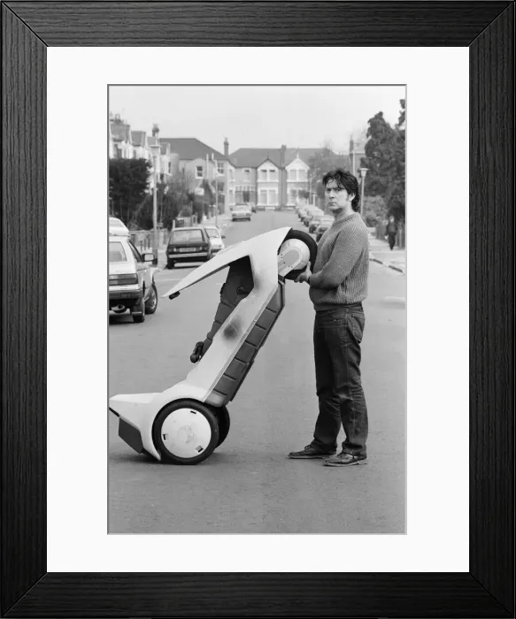 Framed Print : 15 stone Roy Stuart of Ilford, Essex, owner of a C5, can only get six miles out of his Framed Print : 15 stone Roy Stuart of Ilford, Essex, owner of a C5, can only get six miles out of his