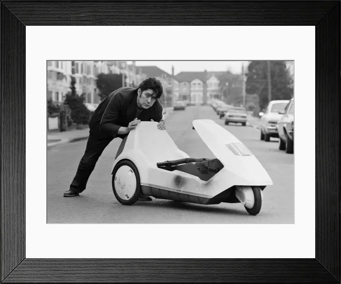 Framed Print : 15 stone Roy Stuart of Ilford, Essex, owner of a C5, can only get six miles out of his Framed Print : 15 stone Roy Stuart of Ilford, Essex, owner of a C5, can only get six miles out of his