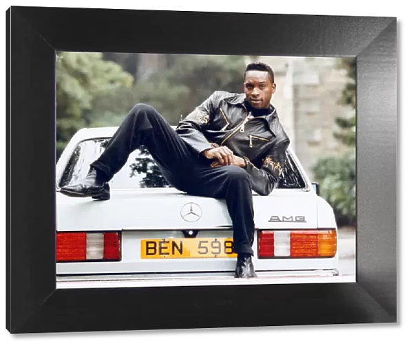 British boxer Nigel Benn with his new custom made Mercedes-Benz. 3rd July 1992