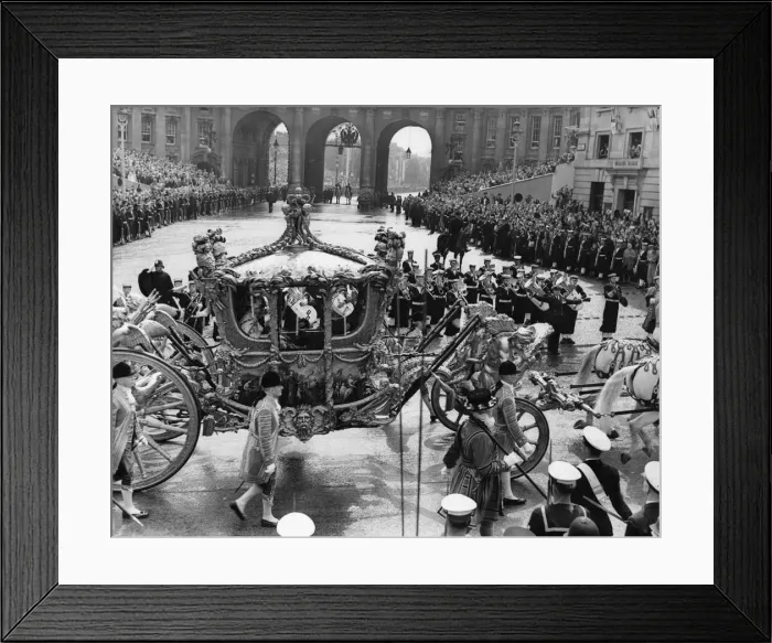 Framed Print : The Queen in the Gold State Coach passing through Trafalgar Square on her return Framed Print : The Queen in the Gold State Coach passing through Trafalgar Square on her return