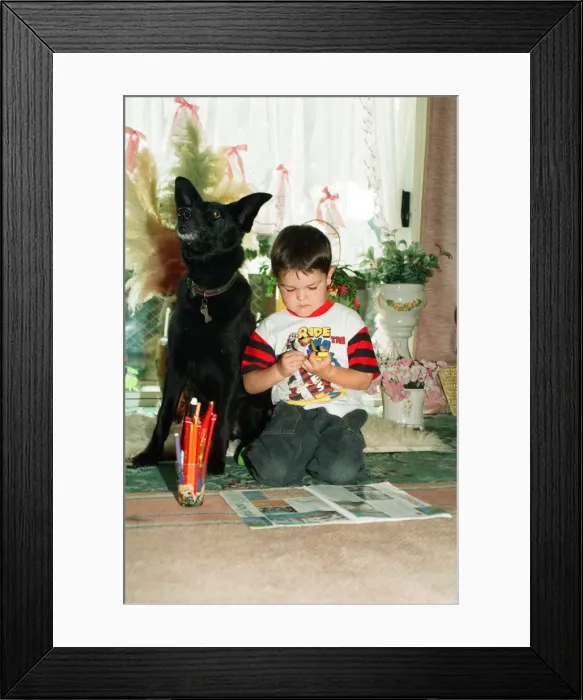 Framed Print : Blackie the dog is pictured with a small boy. 17th June 1993 Framed Print : Blackie the dog is pictured with a small boy. 17th June 1993