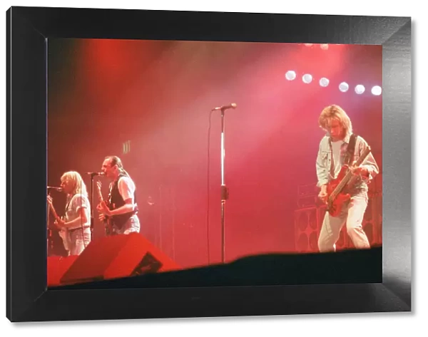 Status Quo in concert at the NEC in Birmingham, 11th December 1990. Our Picture Shows
