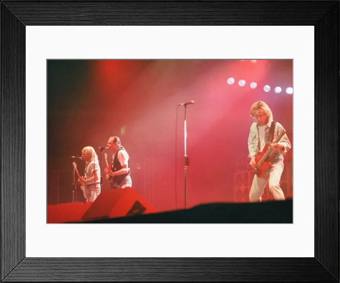 Framed Print : Status Quo in concert at the NEC in Birmingham, 11th December 1990. Our Picture Shows Framed Print : Status Quo in concert at the NEC in Birmingham, 11th December 1990. Our Picture Shows