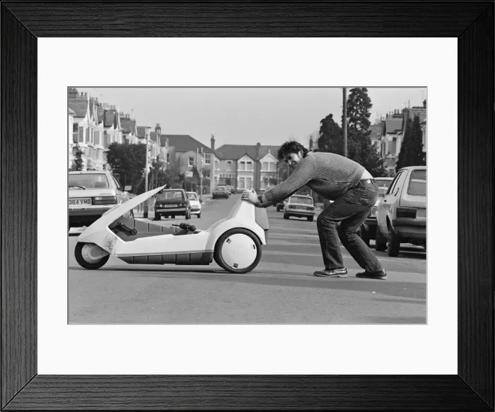 Framed Print : 15 stone Roy Stuart of Ilford, Essex, owner of a C5, can only get six miles out of his Framed Print : 15 stone Roy Stuart of Ilford, Essex, owner of a C5, can only get six miles out of his