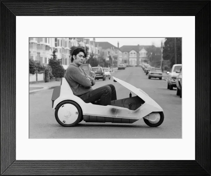 Framed Print : 15 stone Roy Stuart of Ilford, Essex, owner of a C5, can only get six miles out of his Framed Print : 15 stone Roy Stuart of Ilford, Essex, owner of a C5, can only get six miles out of his
