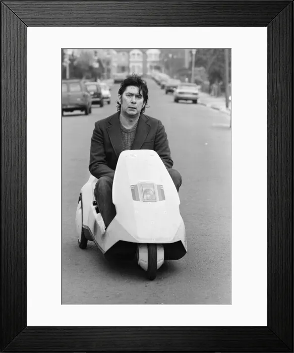 Framed Print : 15 stone Roy Stuart of Ilford, Essex, owner of a C5, can only get six miles out of his Framed Print : 15 stone Roy Stuart of Ilford, Essex, owner of a C5, can only get six miles out of his