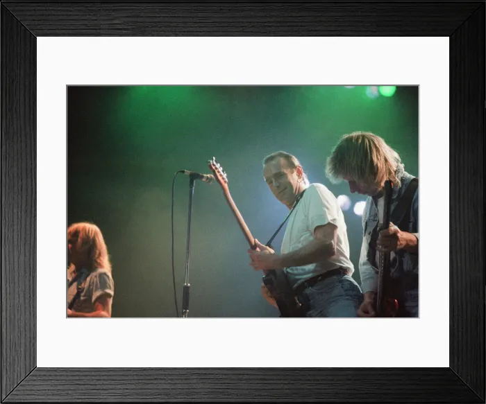 Framed Print : Status Quo in concert at the NEC in Birmingham, 11th December 1990. Our Picture Shows Framed Print : Status Quo in concert at the NEC in Birmingham, 11th December 1990. Our Picture Shows