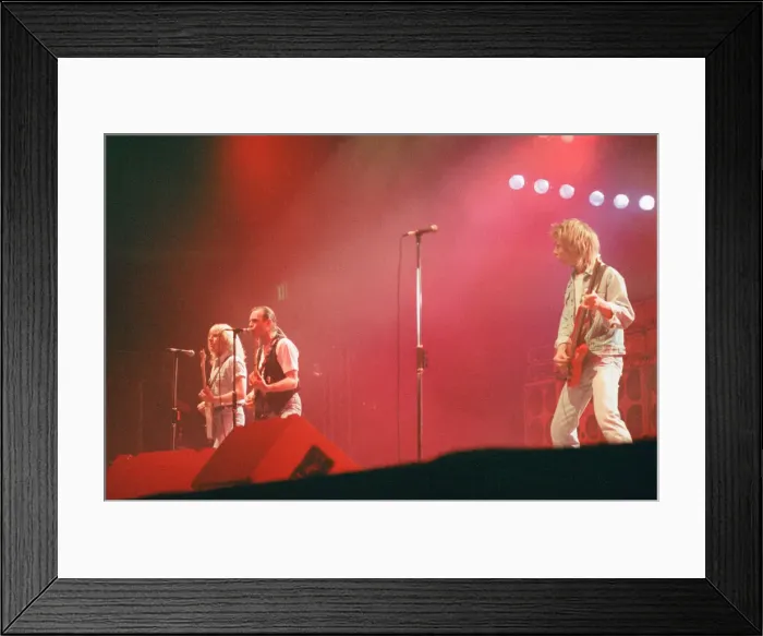Framed Print : Status Quo in concert at the NEC in Birmingham, 11th December 1990. Our Picture Shows