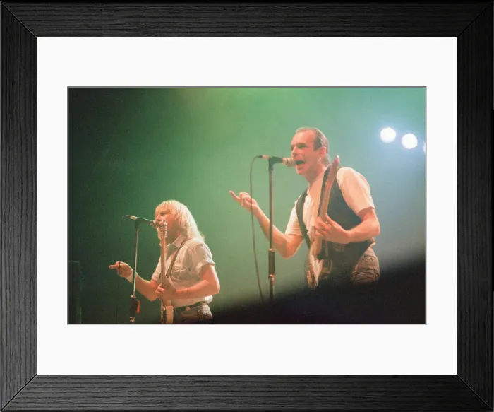 Framed Print : Status Quo in concert at the NEC in Birmingham, 11th December 1990. Our Picture Shows Framed Print : Status Quo in concert at the NEC in Birmingham, 11th December 1990. Our Picture Shows