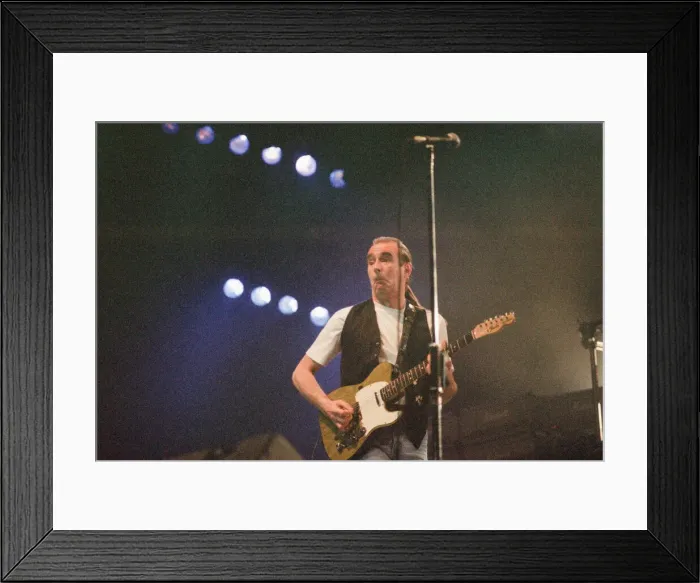 Framed Print : Status Quo in concert at the NEC in Birmingham, 11th December 1990. Our Picture Shows Framed Print : Status Quo in concert at the NEC in Birmingham, 11th December 1990. Our Picture Shows