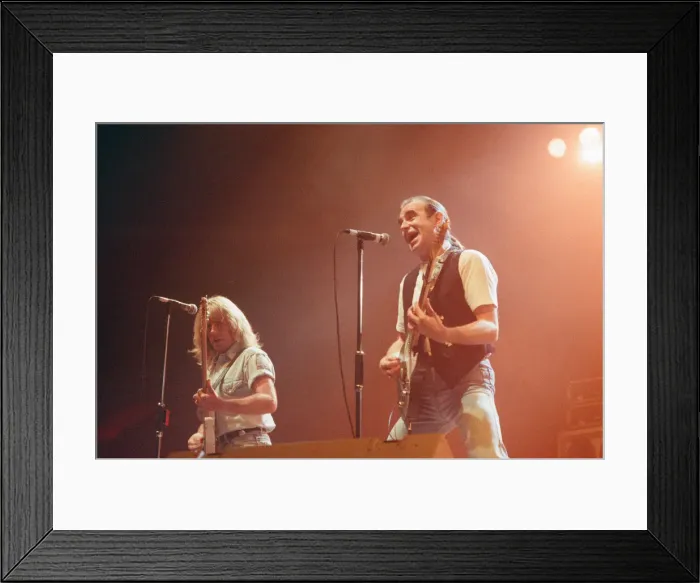 Framed Print : Status Quo in concert at the NEC in Birmingham, 11th December 1990. Our Picture Shows Framed Print : Status Quo in concert at the NEC in Birmingham, 11th December 1990. Our Picture Shows